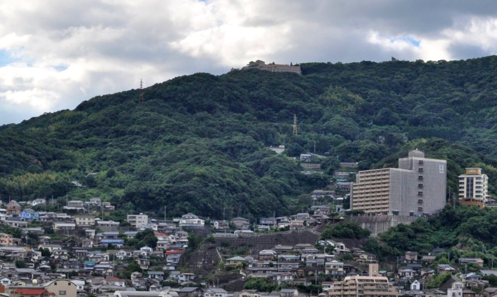 Yumihari no Oka Hotel, on Mt. Shokan-dake above Sasebo. You can also see the sharp point of the roof over the observatory, rising above the trees farther up the hill.