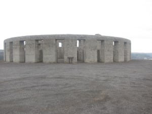 Stonehenge replica made of concrete and perched on a ledge above the Columbia River.