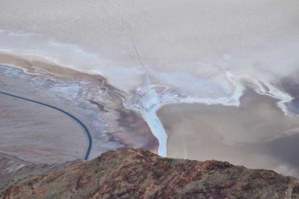 The white path is what we walked on the day before. The black curved strip is the paved road. From Dante's View we could actually discern little black people specks on the white.