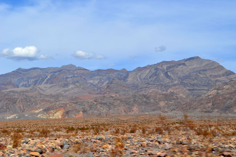 Is it cliche to call this a natural tapestry? How else would you describe these colours and swirls and dynamic fingerpainted streaks across the mountainsides?