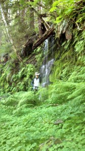 Me being silly in my Tilley hat. The waterfall is near the end of our hike, beside the river.