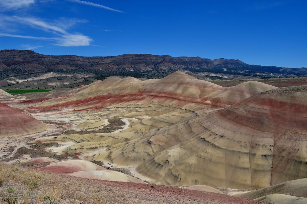 What a spectacular scene. From this distance, I could only guess at the texture and composition of the hills.