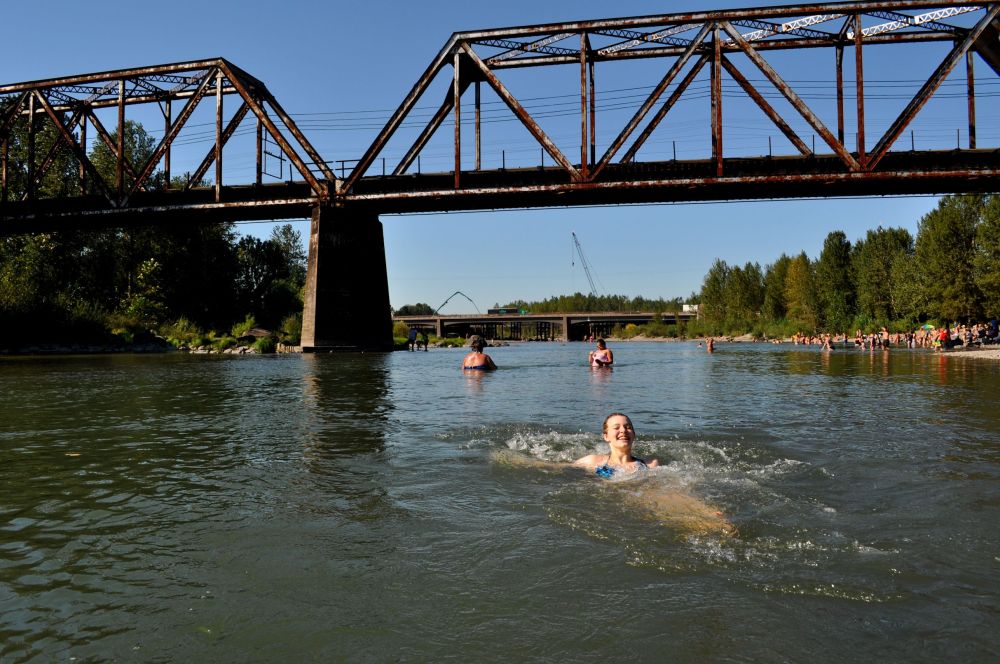 My T jumps into the Sandy River