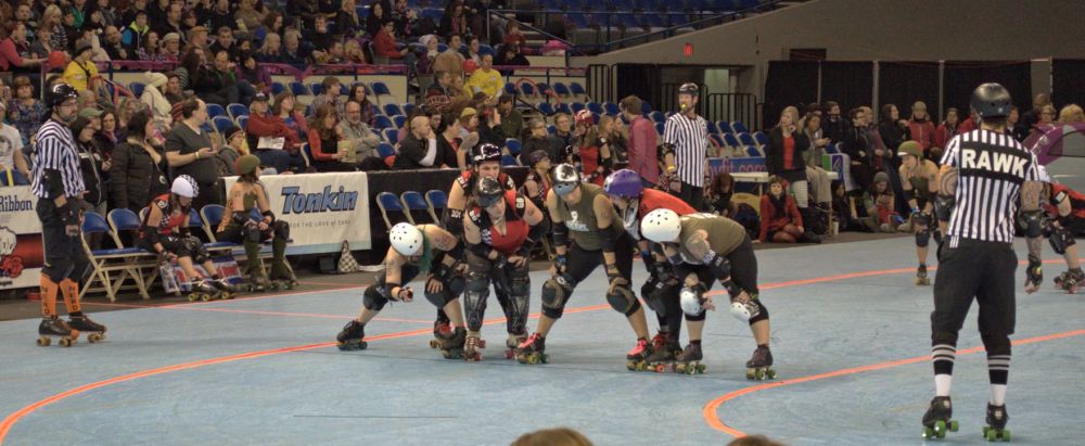 Blockers in a group, getting ready for the start whistle