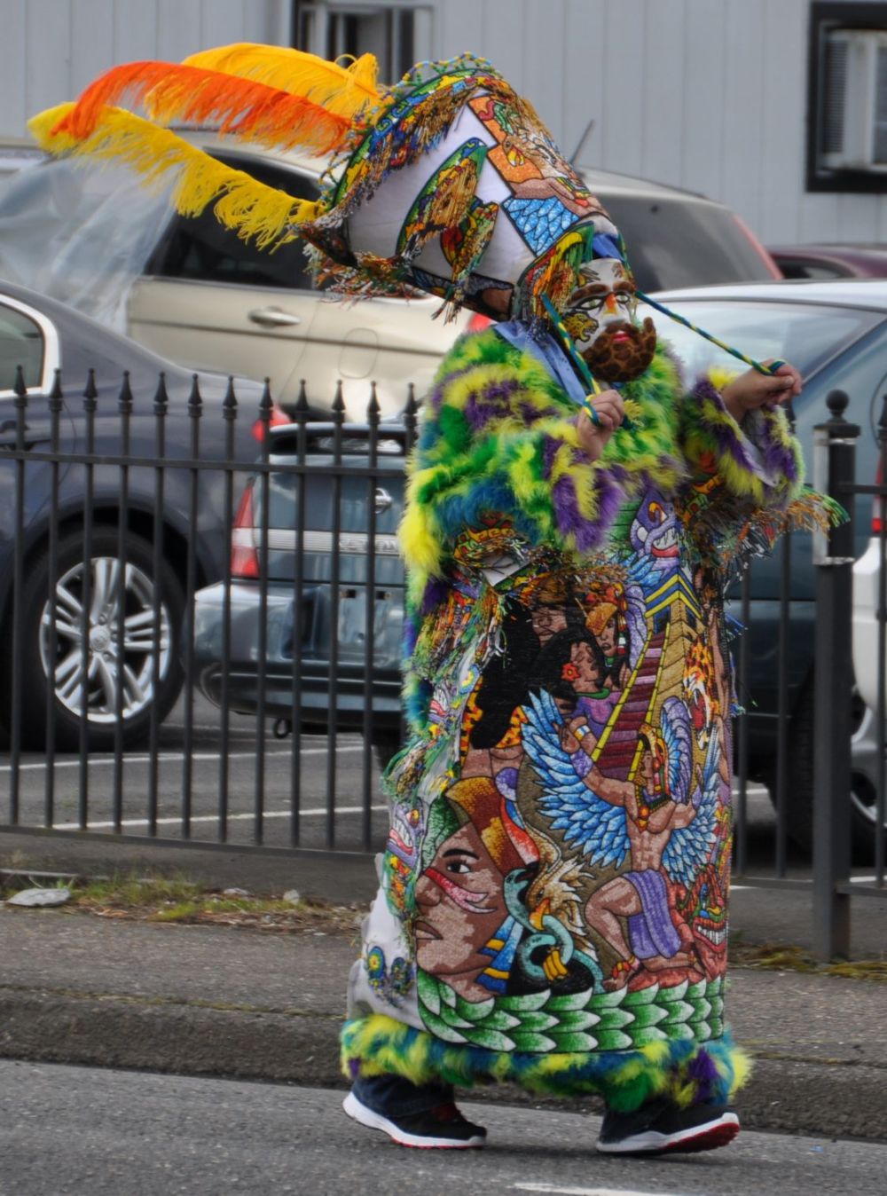 Elaborate costume with stylized upturned beard.