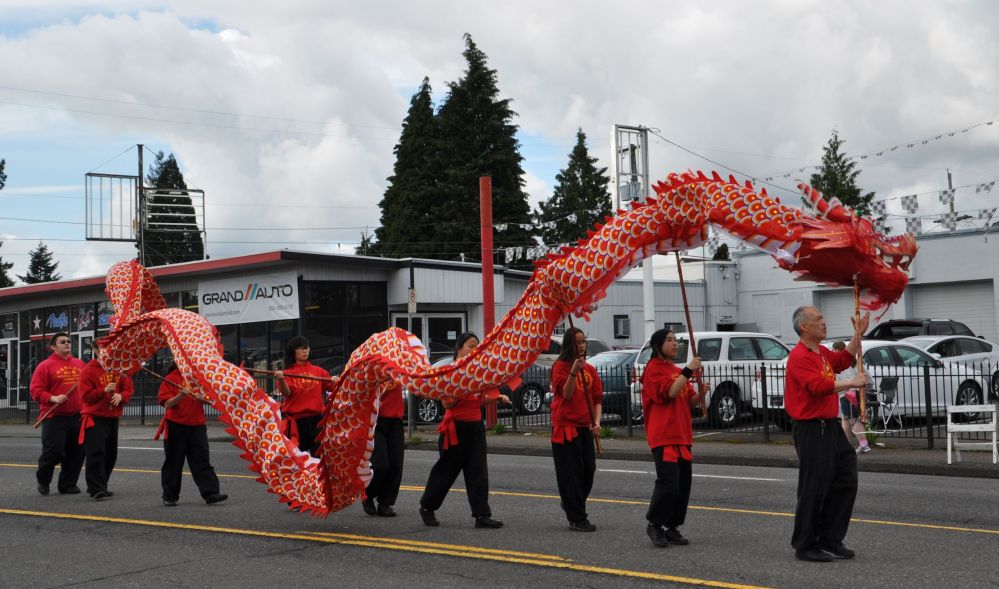 Must have a Chinese dragon at a parade! They handled those sticks with a lot of skill.