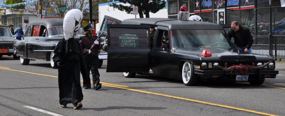 More comedy from the County Corner. There are all manner of the dead and mysterious marching with this hearse.