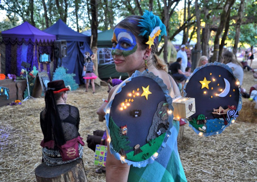 Each side of the embroidery hoop told a part of a faery story.