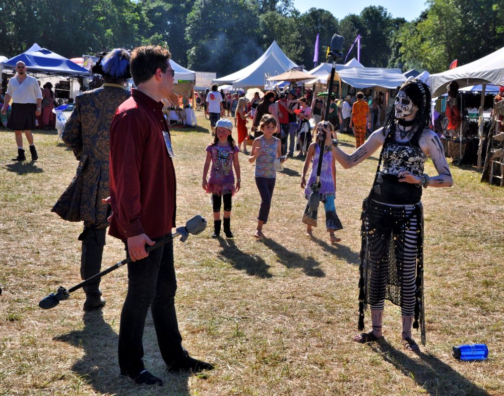 Characters teach each other juggling tricks.