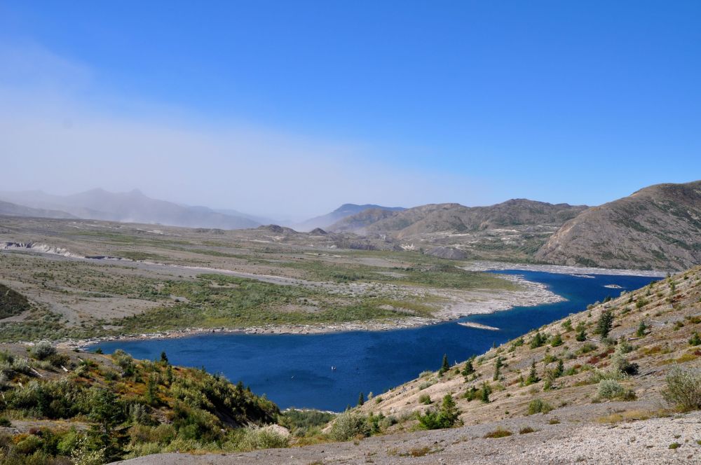 Spirit Lake in the foreground, and the ashy skies behind it.