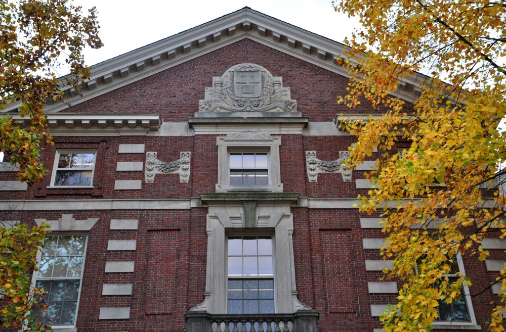 Yellow leaves and red brick