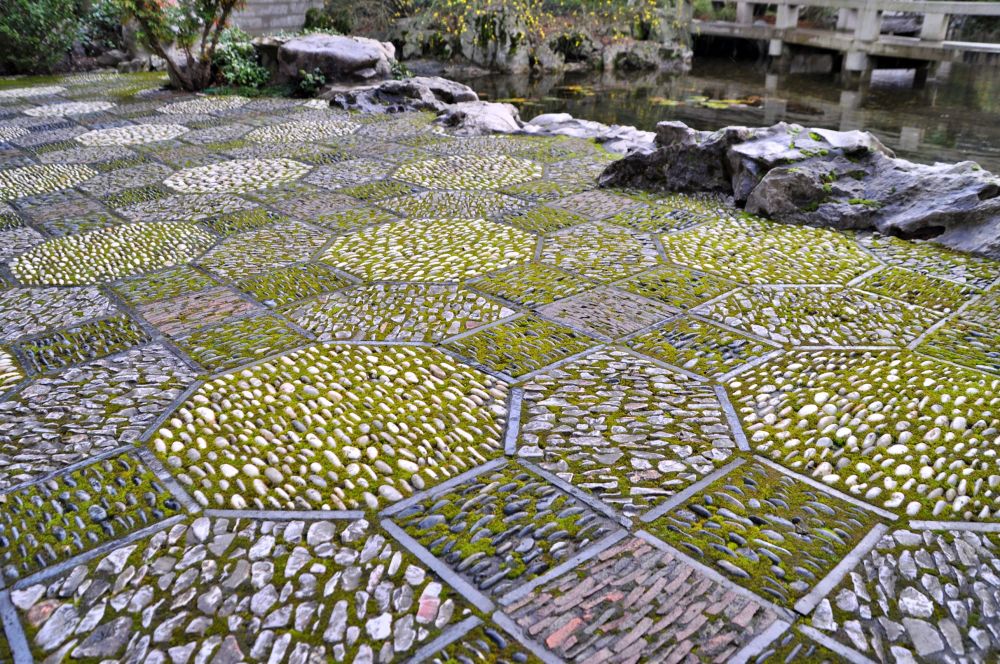 The stone tiles are particularly remarkable throughout the garden. The pattern changes to suit each section.