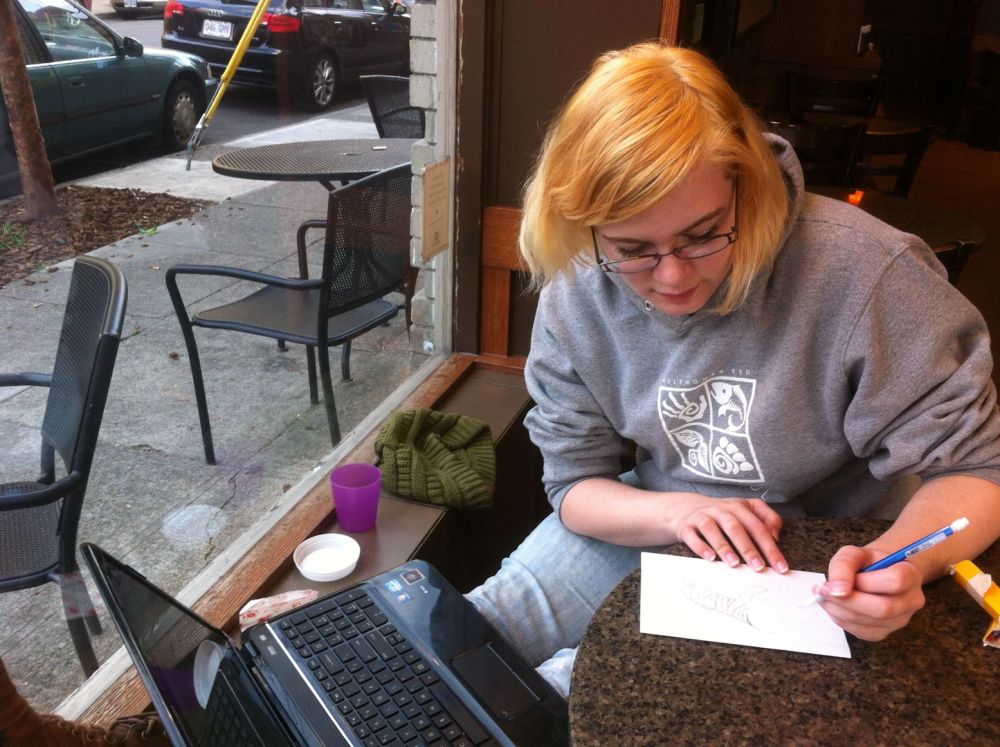 Tara designing wildlife cards.