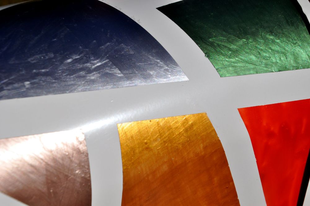 Close-up so you can see how amazingly beautiful the colours are. Sadly, nail polish does not seem designed to withstand sunlight, and there are signs of fading already. I'll check in after a year or so, and let you see how it holds up.