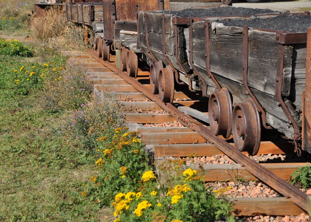 A little train of coal cars outside the museum, filled with actual coal.