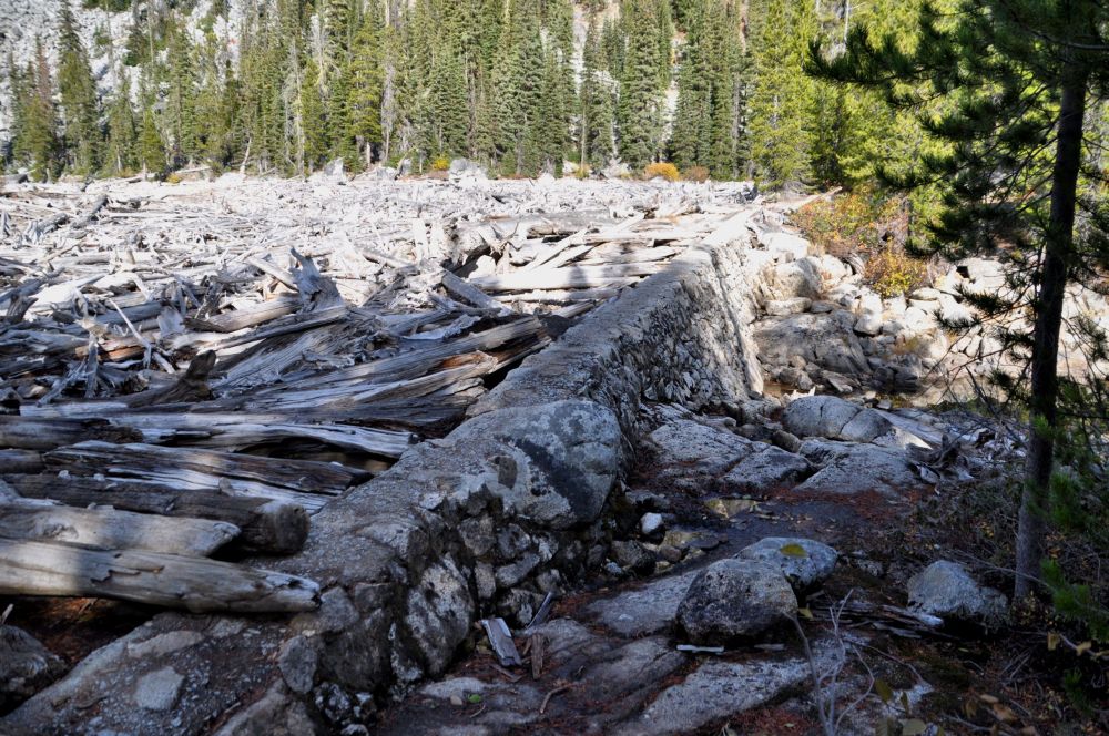 The dam between Upper and Lower Snow Lakes doubles as part of the trail.