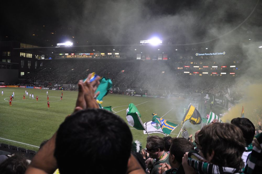 Flags and smoke in the air.