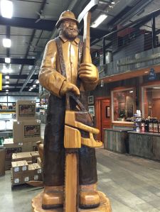 Chainsaw carving inside the lawnmower repair store.