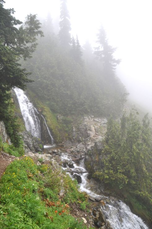 Large and lovely waterfall splashes over the Pacific Crest Trail.